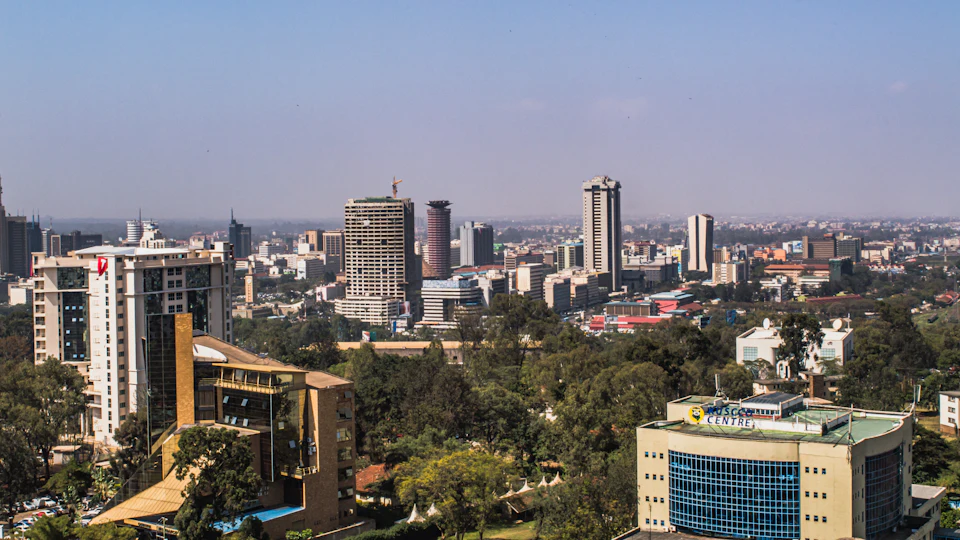 Nairobi skyline with modern towers and green spaces